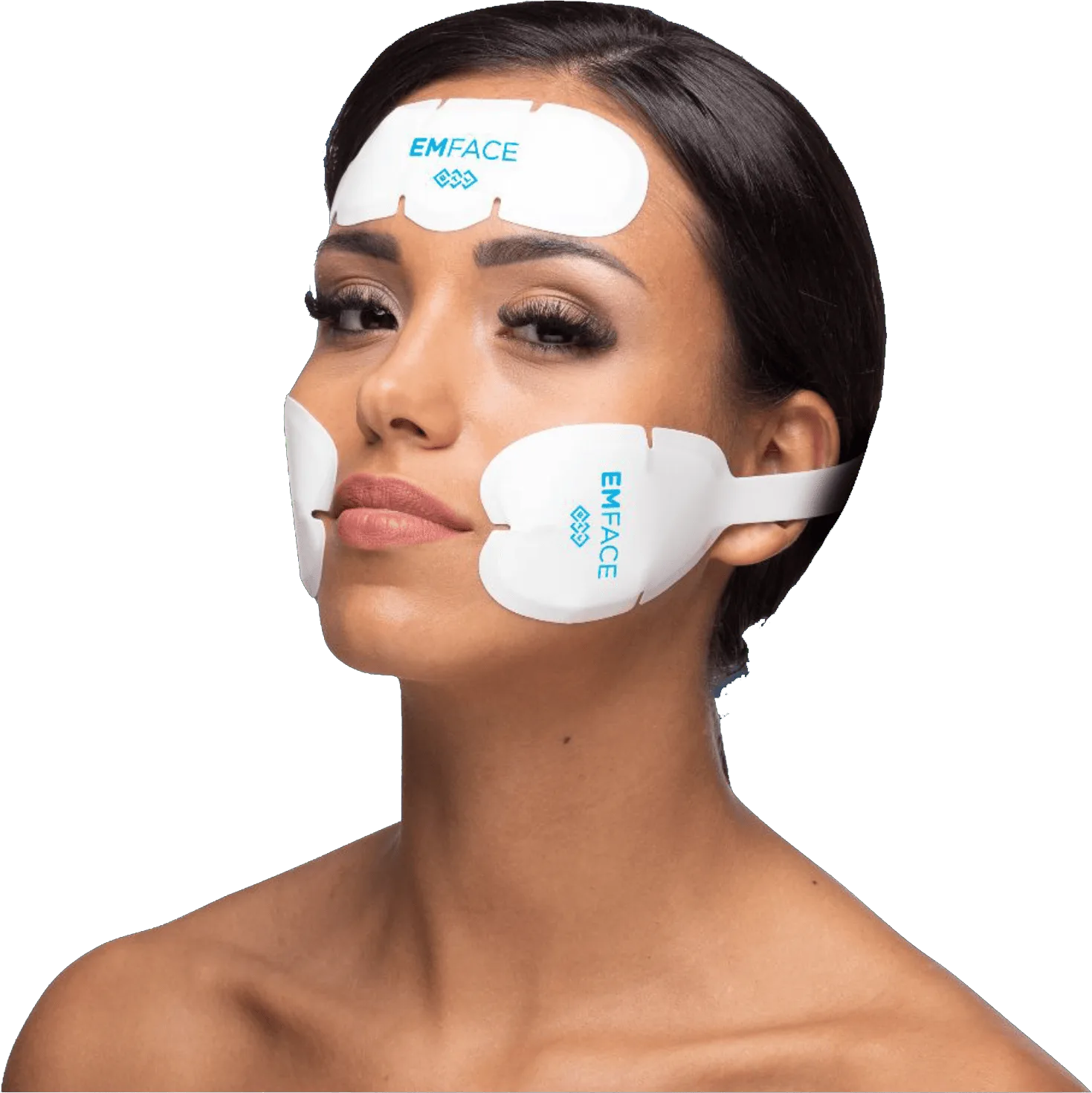 Woman wearing facial treatment applicators on her forehead and cheeks at our Chelsea clinic, EMface facial toning London